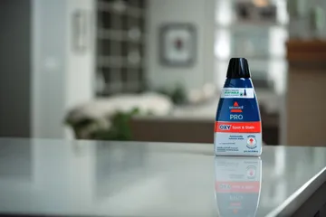 PRO OXY Spot & Stain with StainProtect Carpet Formula on counter.