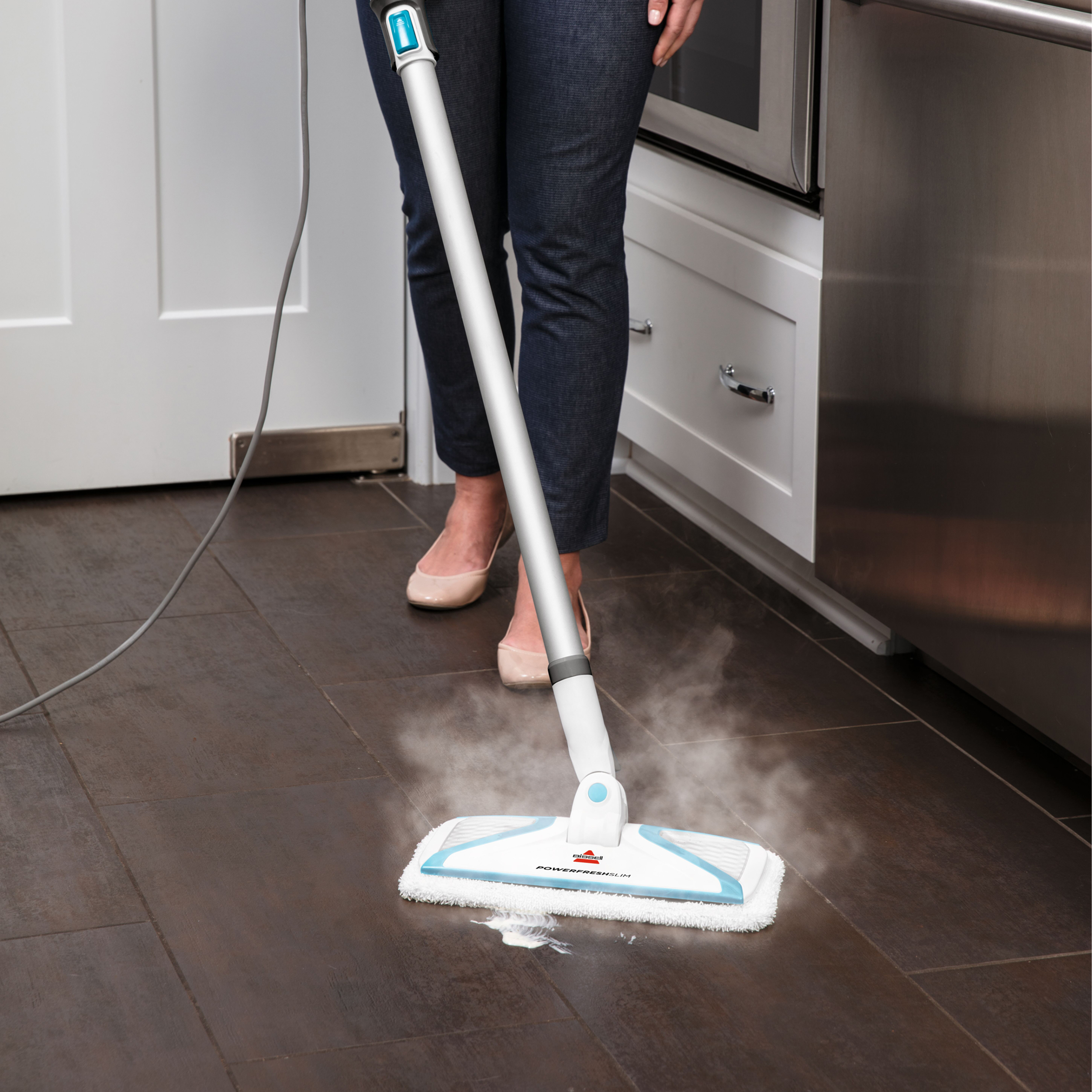 PowerFresh Slim 3-in-1 Steam Mop Steaming Spill on hard flooring. 