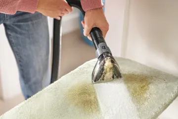 Cleaning spilled stain on couch cushion