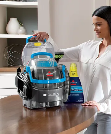 Pulling Clean Water Tank out of Little Green Pet Pro Portable Carpet Cleaner.