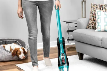 Using Fingertip Controls to adjust to vacuuming on hard flooring