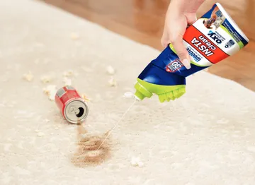 Woolite INSTAclean Stain Remover cleaning soda stain off area rug