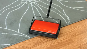 REFRESH Carpet Sweeper sweeping area rug and hard flooring