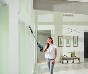 Using CleanView Pet Slim Cordless Stick Vac with Extension Wand to Vacuum above Floors.