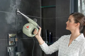 Steam Shot Handheld steamer steaming shower tile