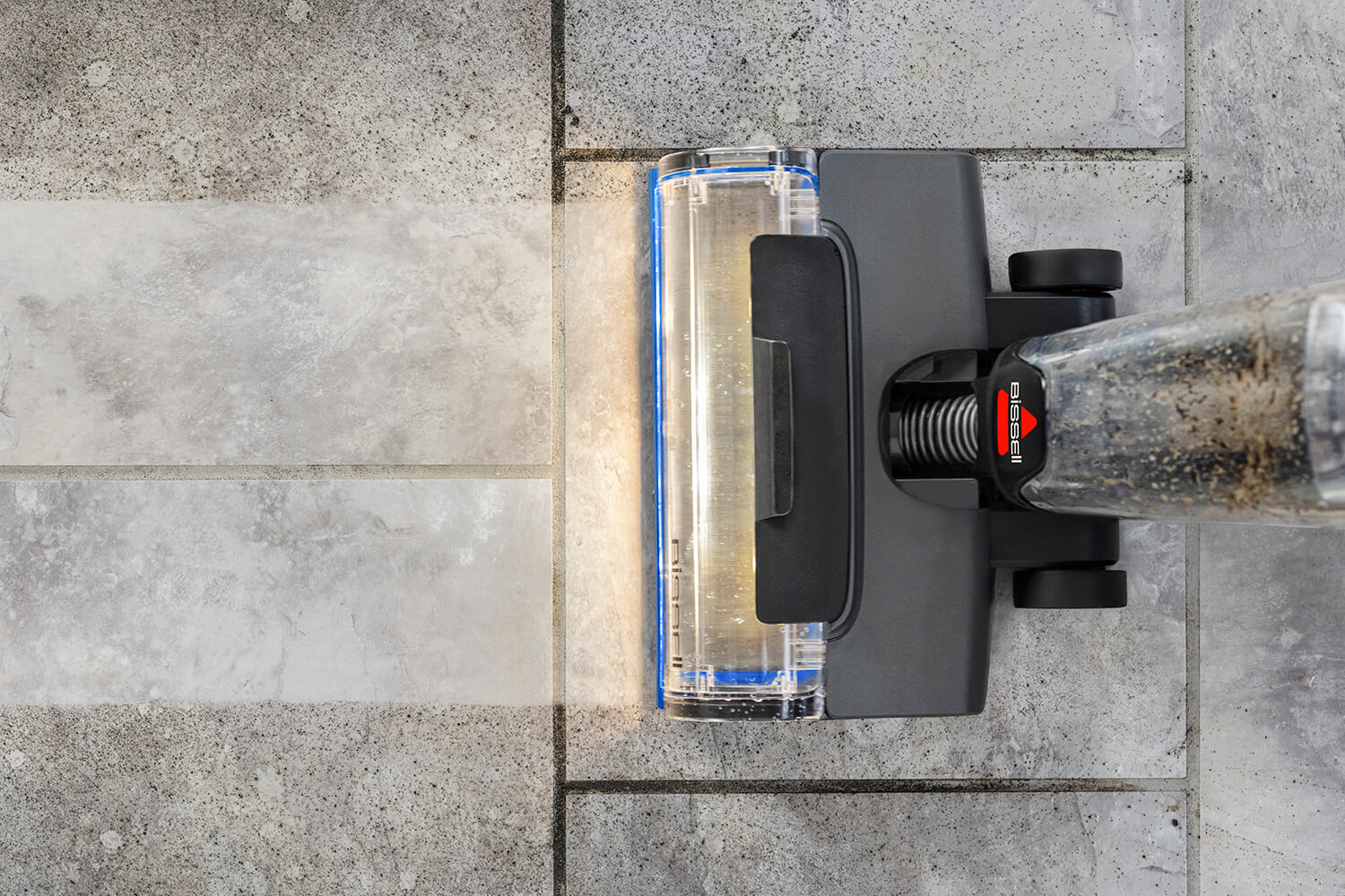 CrossWave vacuuming and mopping dirt from tile floors