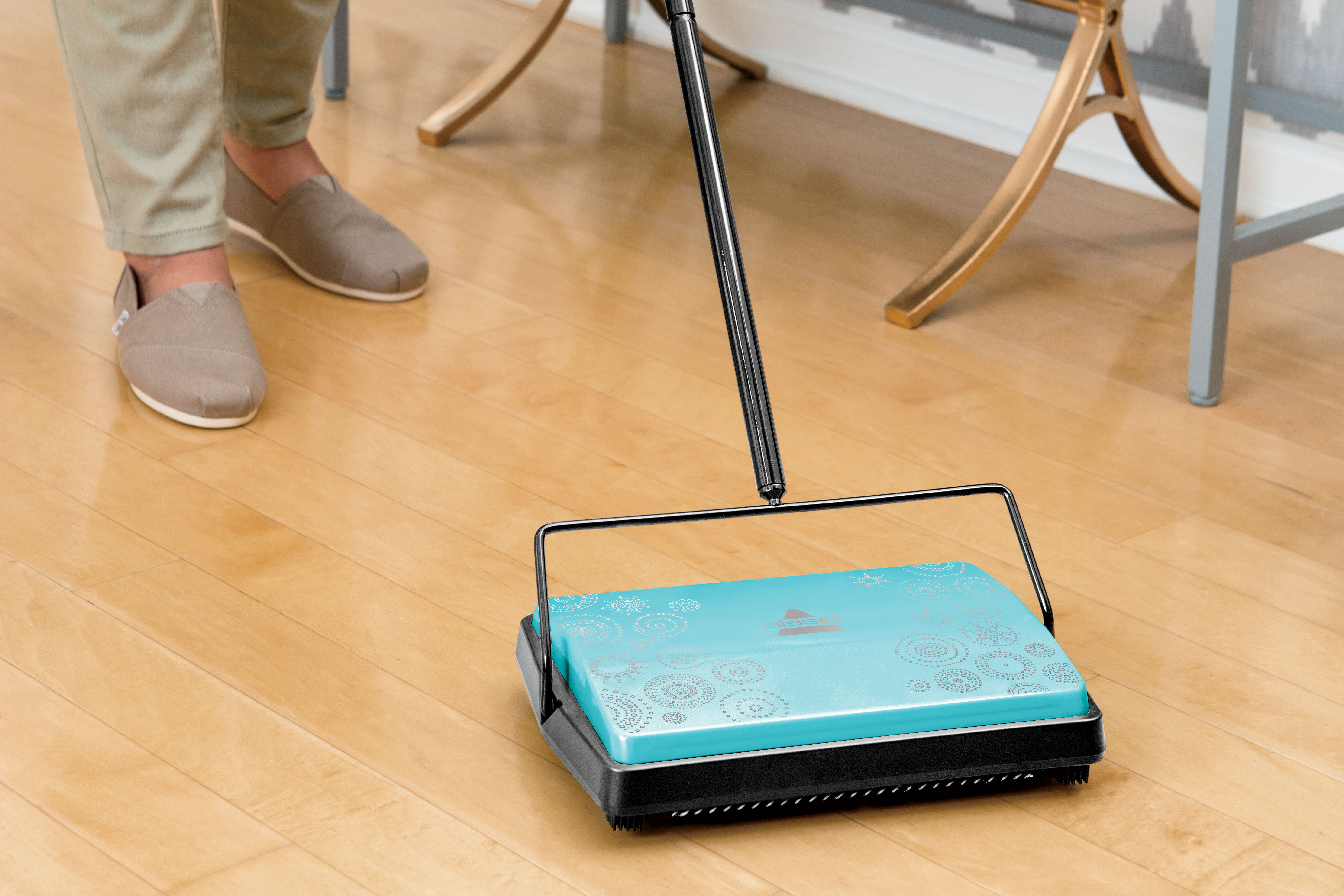 REFRESH Manual Sweeper cleaning on hard flooring.