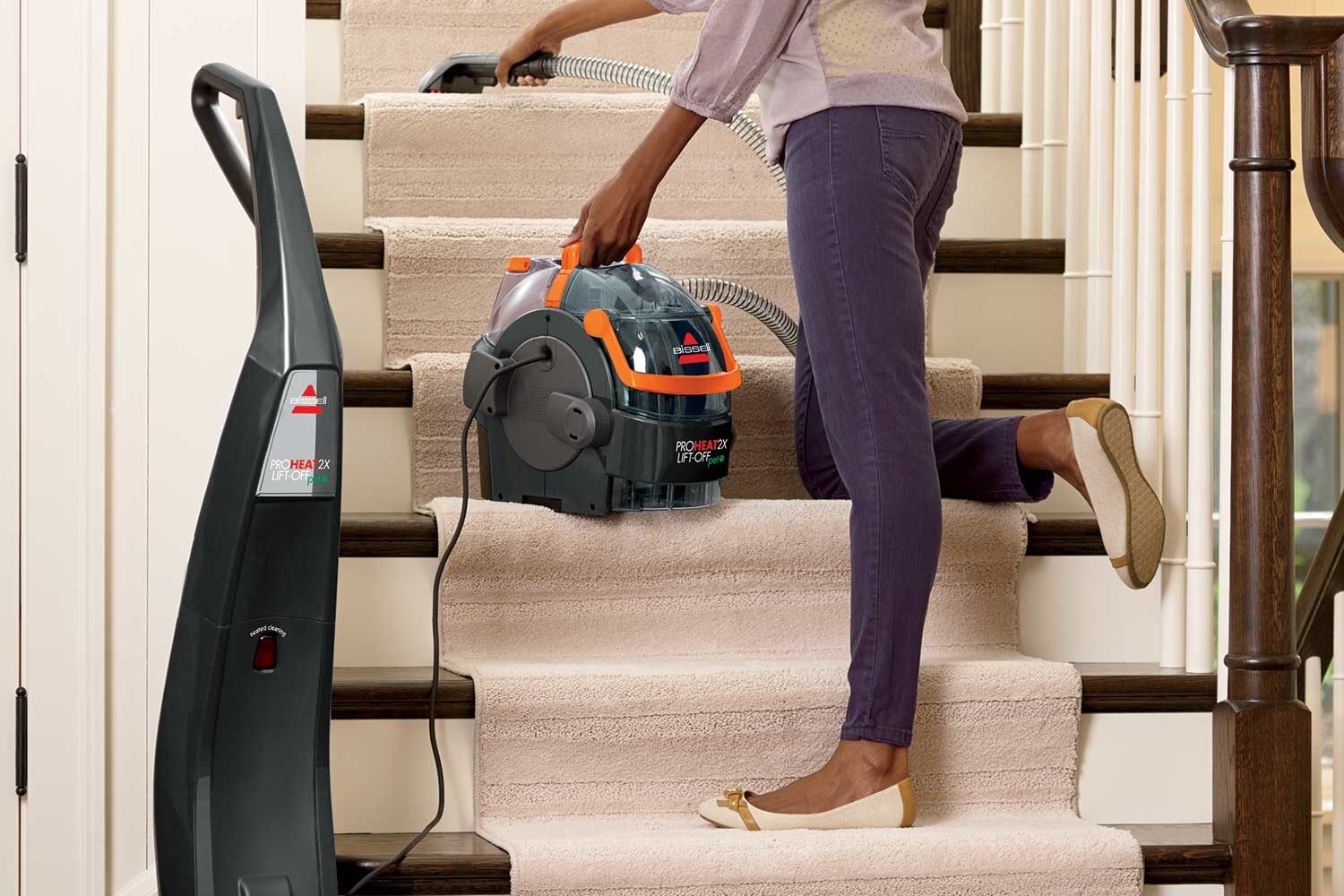 ProHeat 2X Lift-Off Pet Carpet Cleaner Using Pod to deep clean stairs.