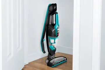 Vacuuming with a compact machine