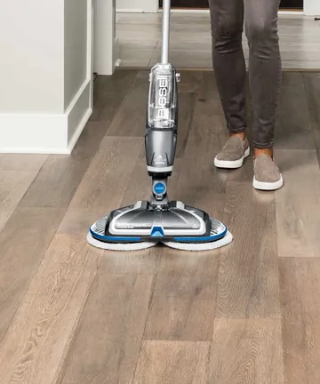 SpinWave Cordless Spin Mop mopping hard flooring.