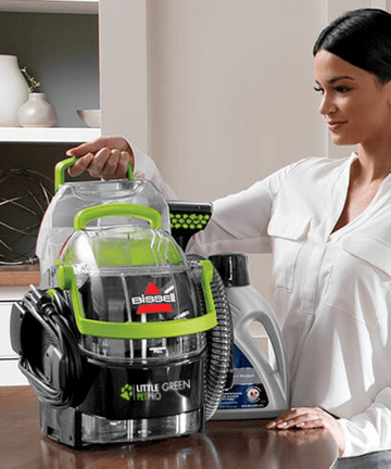 Pulling Clean Water Tank out of Little Green Pet Pro Portable Carpet Cleaner.