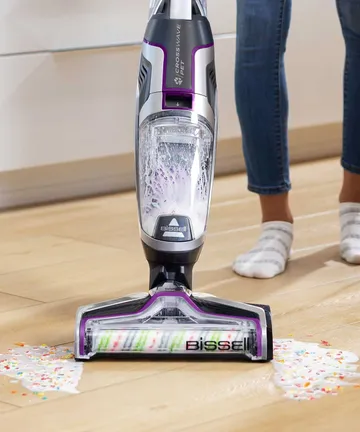 CrossWave Pet Pro Wet Dry Vac Vacuuming and Mopping spilled milk and cereal from hard flooring.