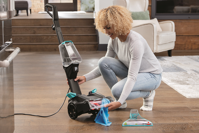 Cleaning nozzle and brushes on foot of TurboClean PowerBrush Carpet Cleaner.
