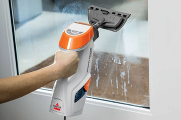 Using PowerFresh Lift Off Steam Mop with attachment to clean windows