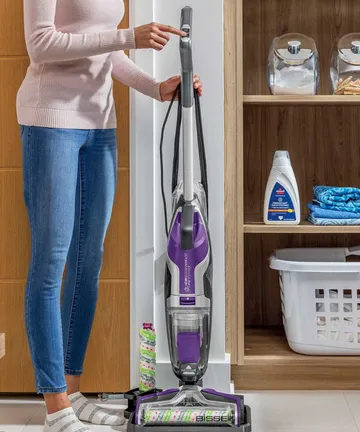 Button on Handle of CrossWave Pet Pro Wet Dry Vac to control spray.