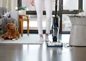CrossWave Cordless Max Multi-Surface Wet Dry Vac mopping and vacuuming spilled mess on tile flooring