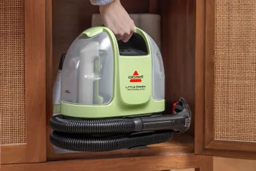 Storing Little Green Mini in cupboard