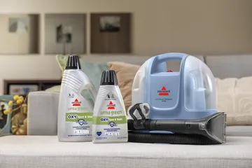 Little Green Mini Portable Carpet Cleaner with included formulas