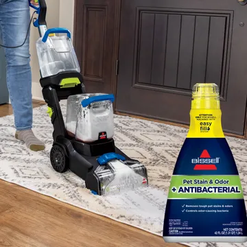 Using TurboClean DualPro carpet cleaner to clean area rug.