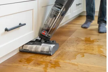 CrossWave Edge vacuuming and mopping spill on hard flooring