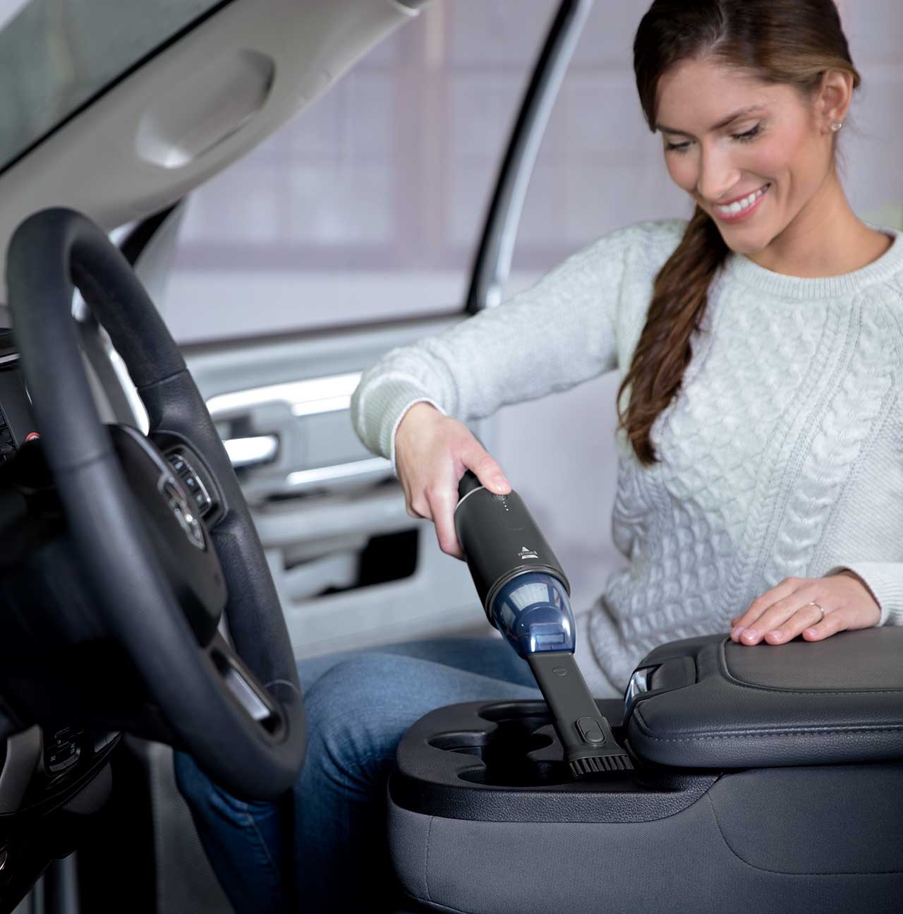 Using AeroSlim Hand Vac to Vacuum car interior 